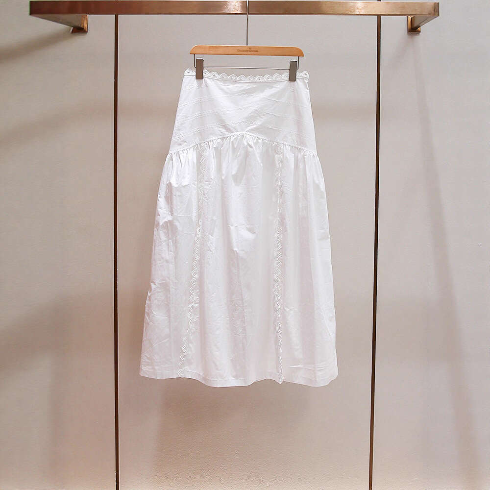 2026 Autumn New French Age Reducing Casual A-line High Waist Design Hollow Middle Length White Women's Short Skirt