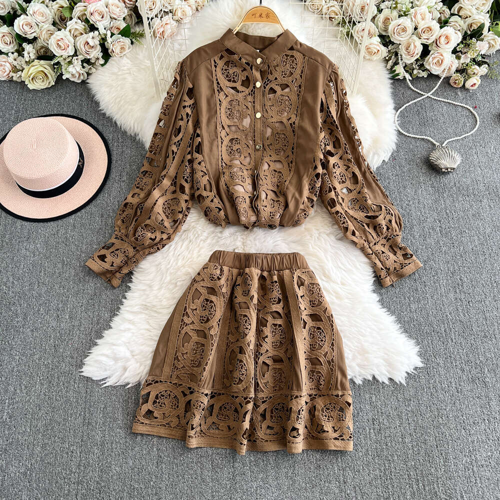 Designer's palace style heavy embroidery hollow out long sleeved shirt top and high waisted short skirt fashionable casual lace