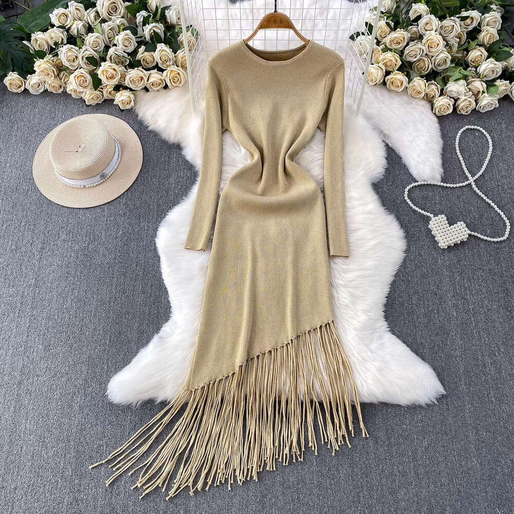 Elegant and delicate shiny silk knitted long sleeved women's 2026 French style new asymmetrical elegant tassel dress