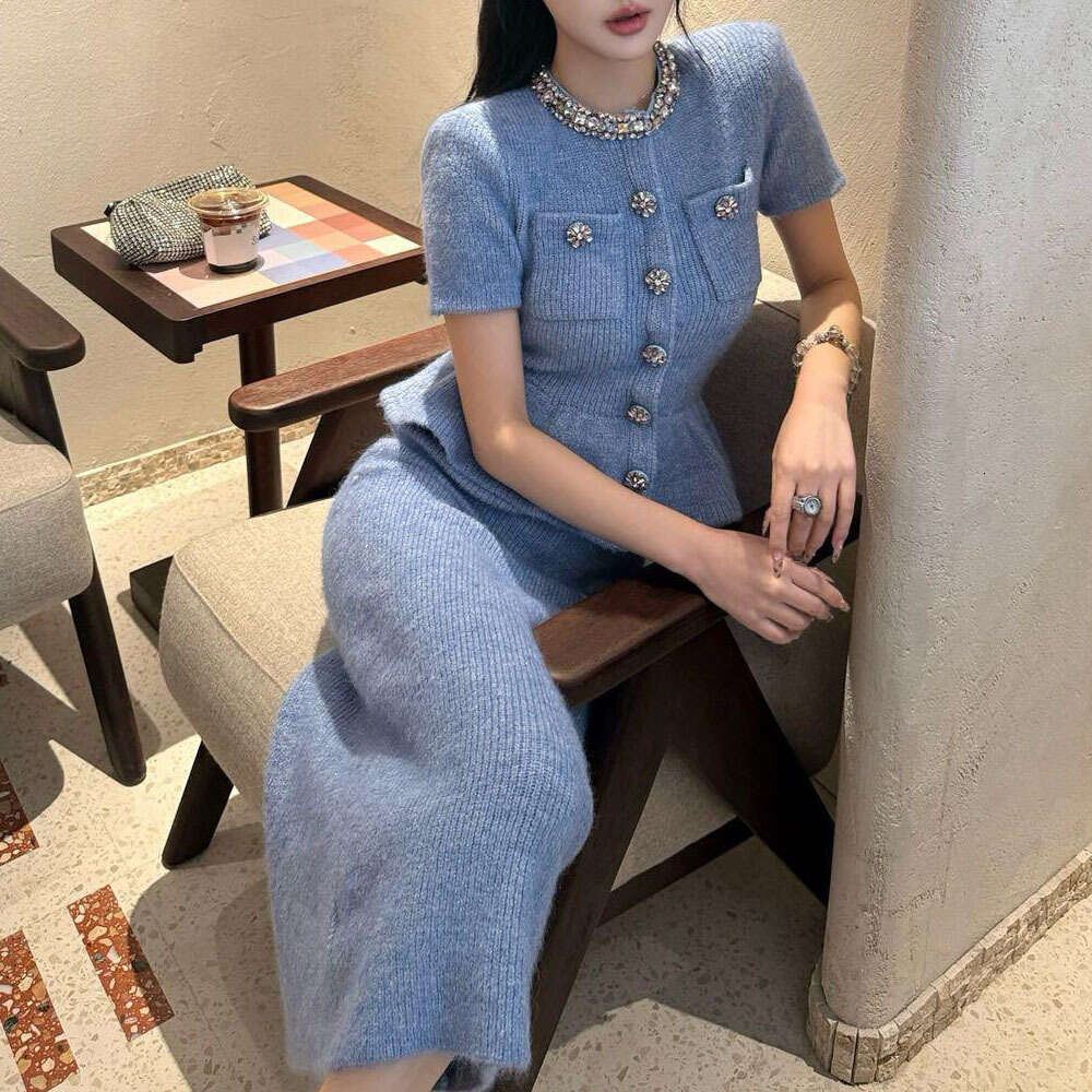 A12 The new women's dress for spring and autumn 2026 features elegant and exquisite design, decorated with round neck short sleeves and long slee