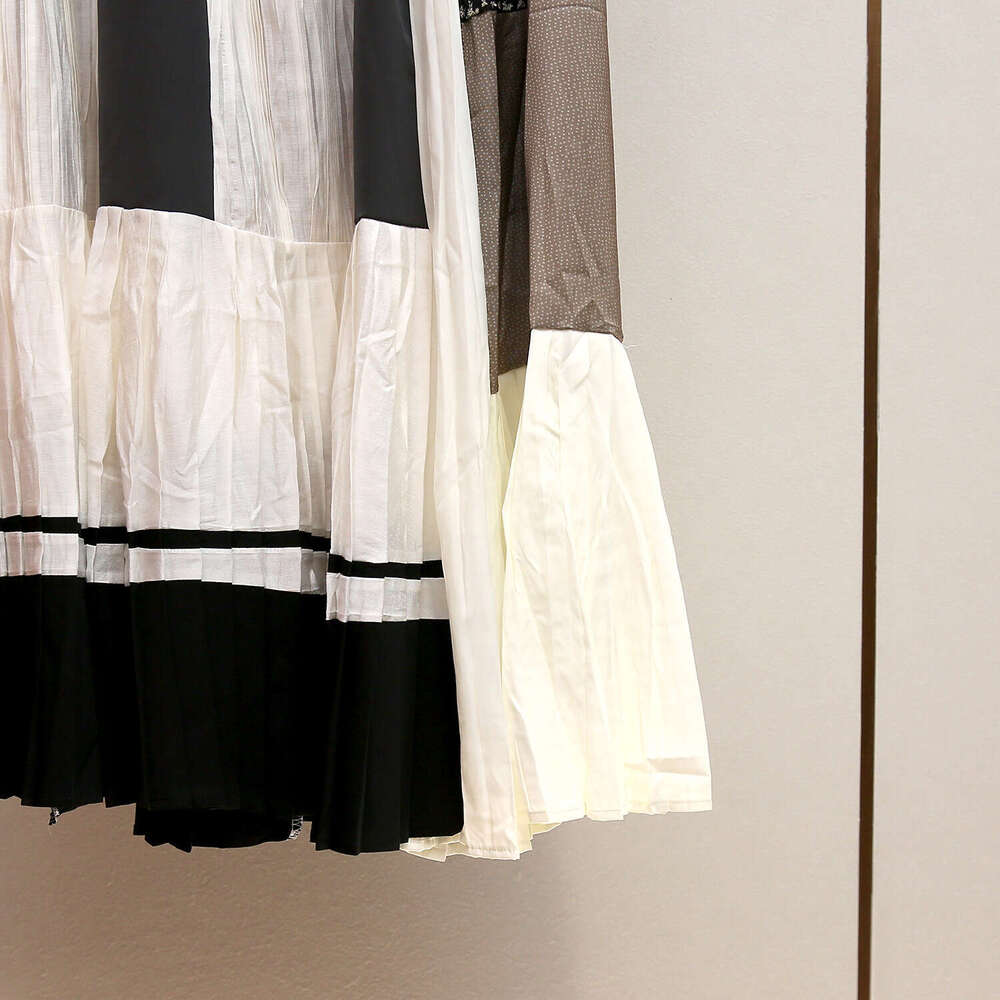 2026 designer high-end women's clothing autumn and winter new style French casual retro color block A-line pleated women's dress