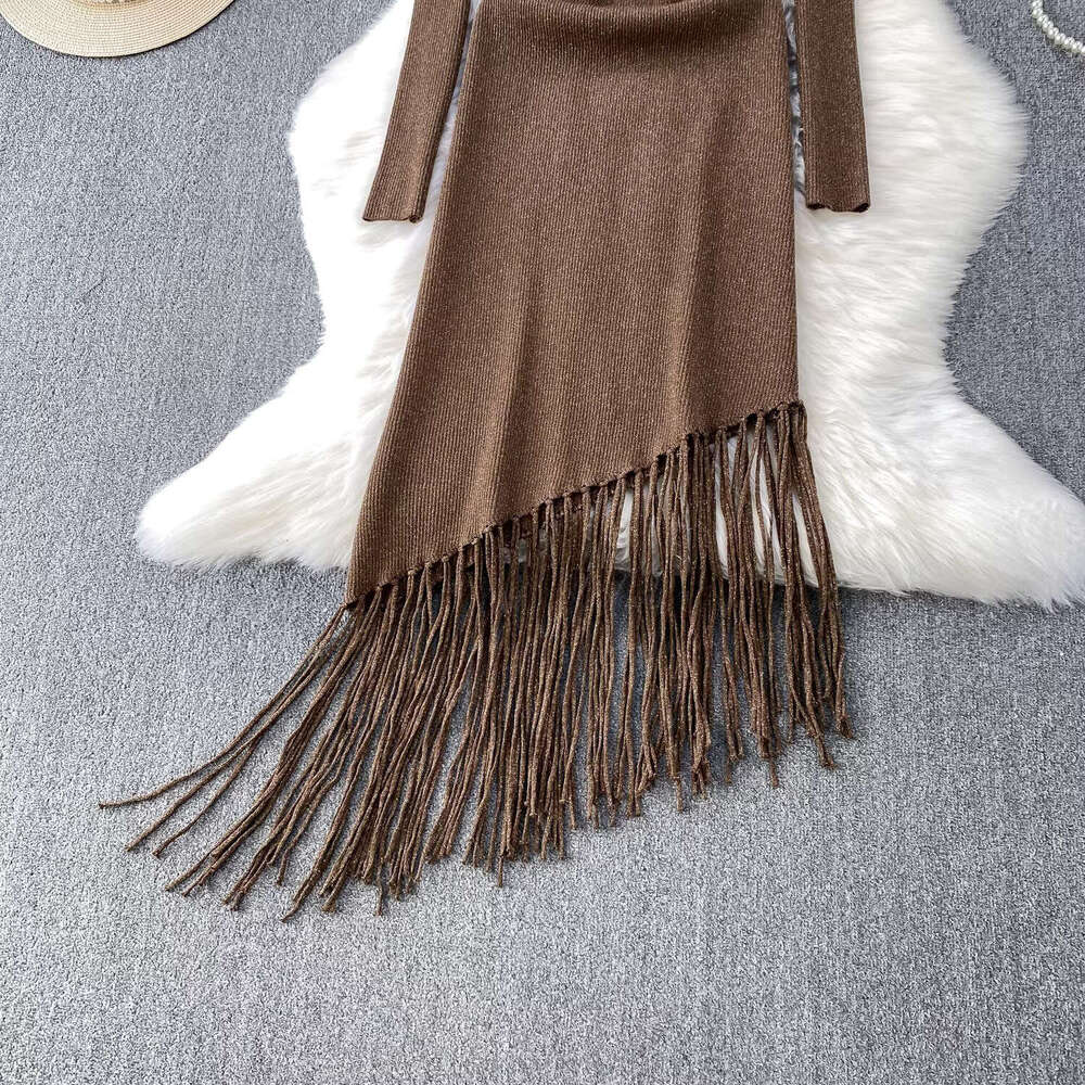 Elegant and delicate shiny silk knitted long sleeved women's 2026 French style new asymmetrical elegant tassel dress