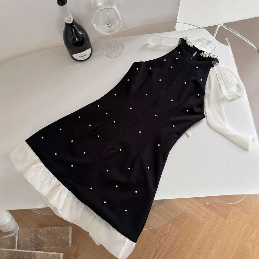 A12 Butterfly condensation back collar black 2026 summer loose fit A-line skirt decorated with unique bead embellishments