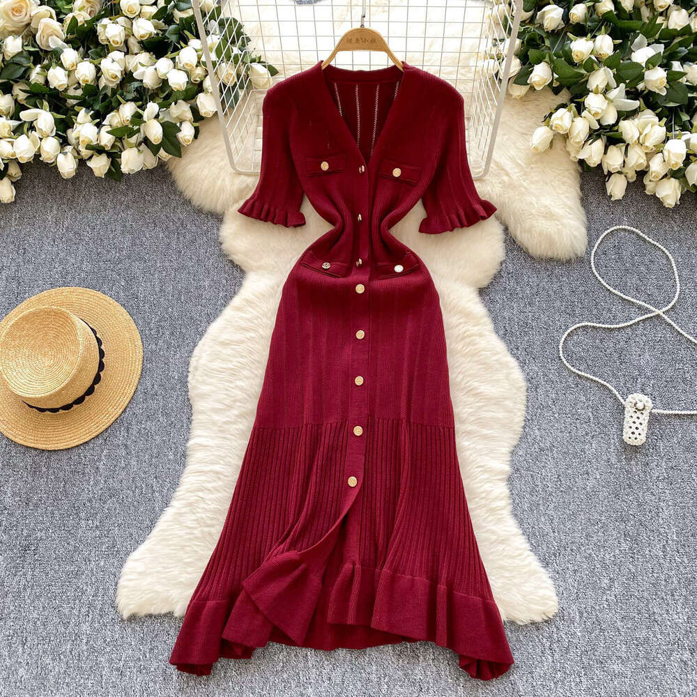 2026 designer French retro style high-end knitted women's summer ruffle edge single breasted elegant and luxurious long skirt
