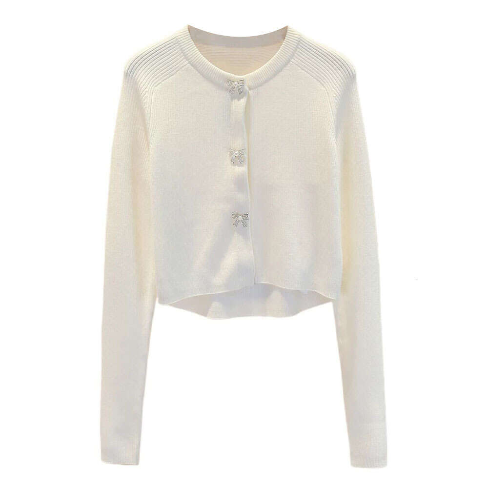 The new women's clothing for the spring and autumn of 2026 adopts a soft knitted cardigan bow and button decoration round neck design