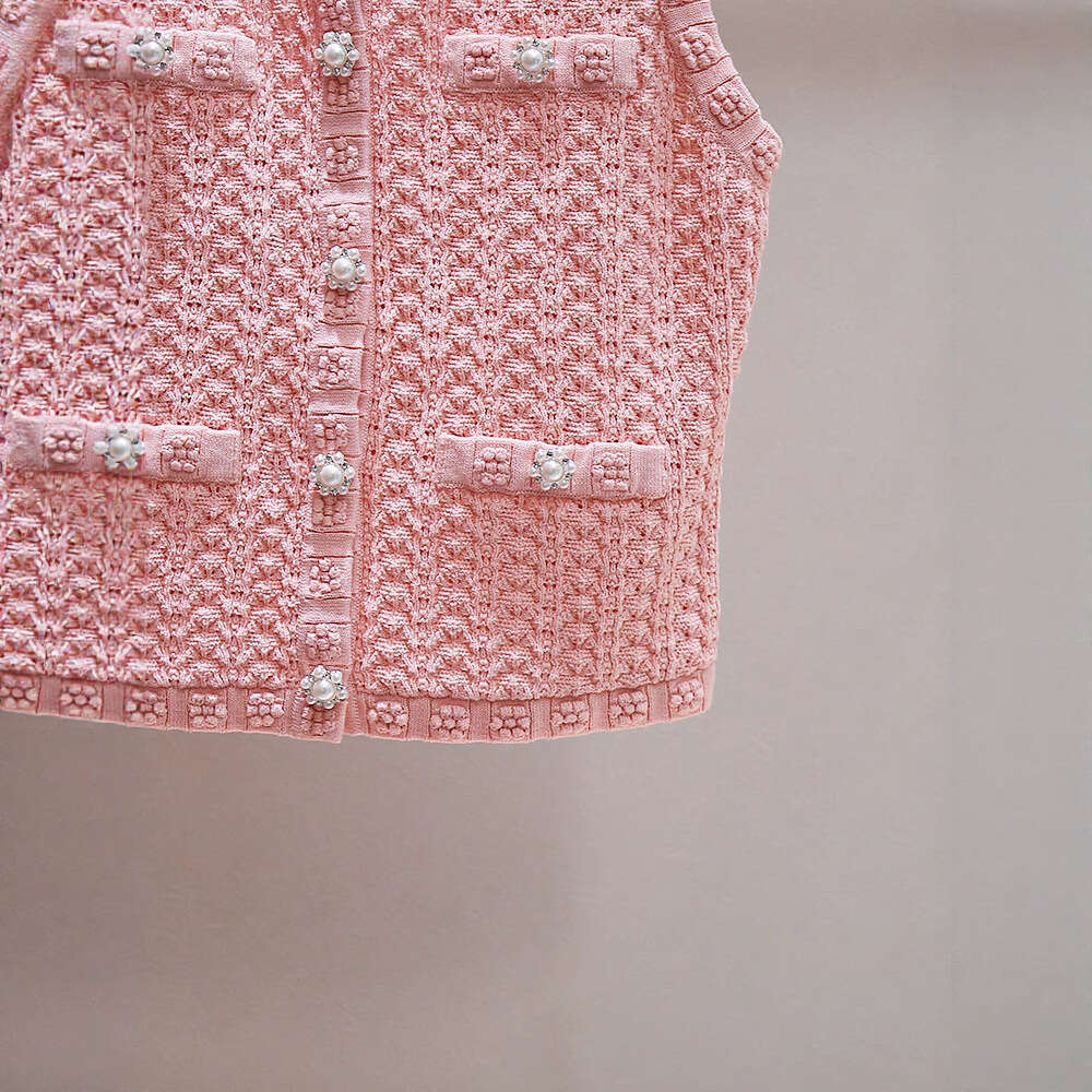 2026 high-end women's spring and summer French niche pink bead hollow single breasted vest knitted sweater