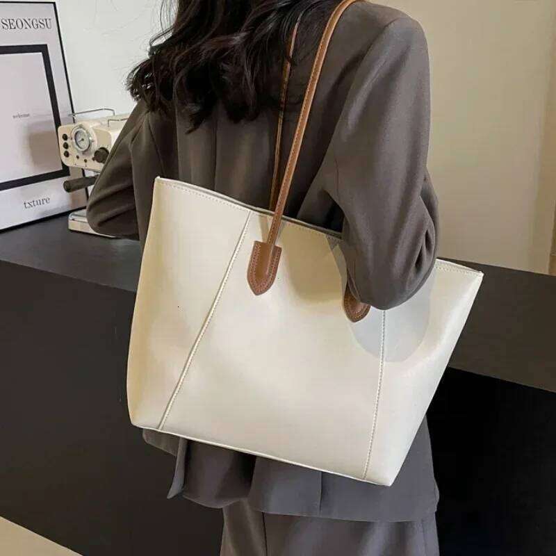 Hot Selling Light Luxury Sewing Thread Pu Zipper Handbag 2026 New Fashionable Women's Commuting Shoulder Tote Bag XJ260306