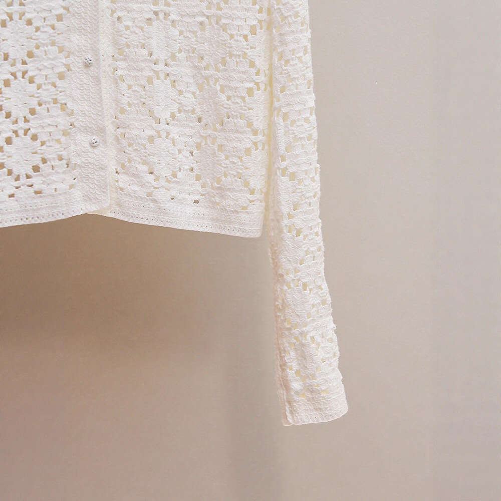 2026 high-end women's fashion autumn new item small fragrance crochet hollow long sleeved loose knit cardigan jacket