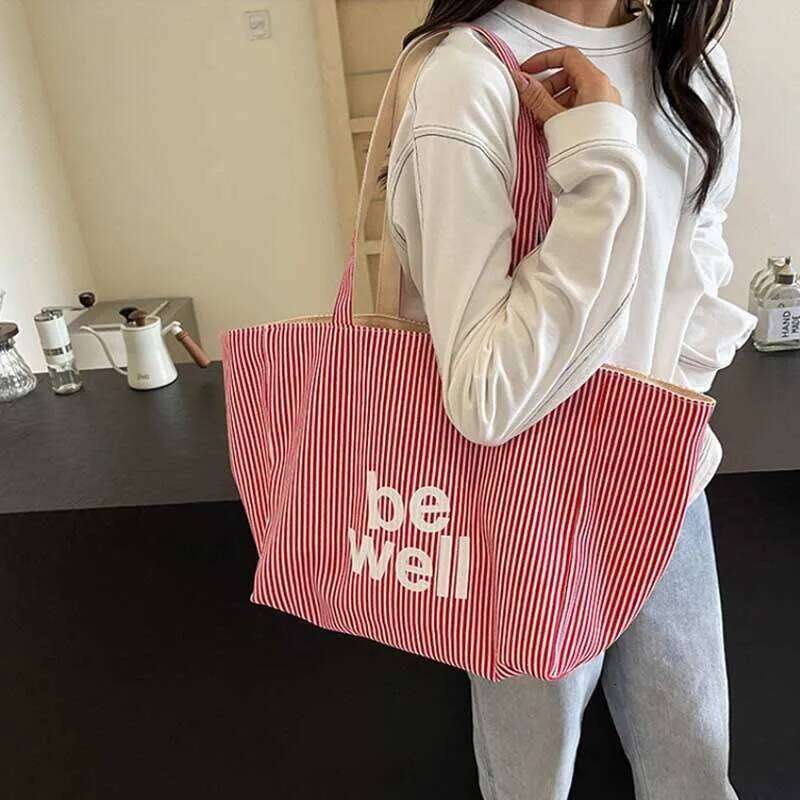 Casual Large Stripe Women's Shoulder 2025 New Fashion Commuter Tote Bag High Capaci Canvas Handbag for Youth bolso mujer XJ260306