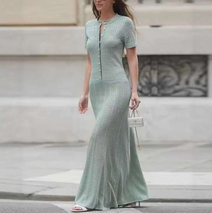 French style new design round neck hollow knit fashionable and elegant A-line long skirt for spring and summer of 2026