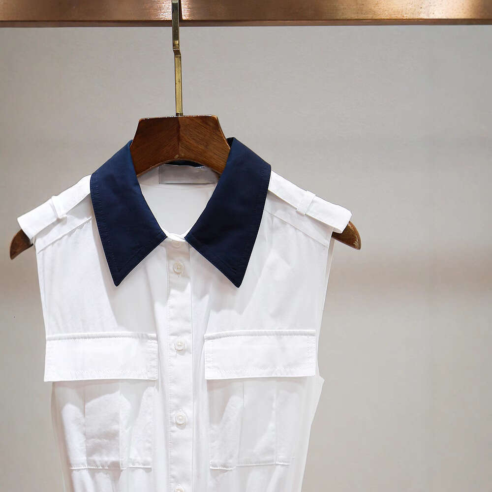 2026 spring and summer color block soft workwear style lapel sleeveless pocket A-line hollowed out embroidered vest dress