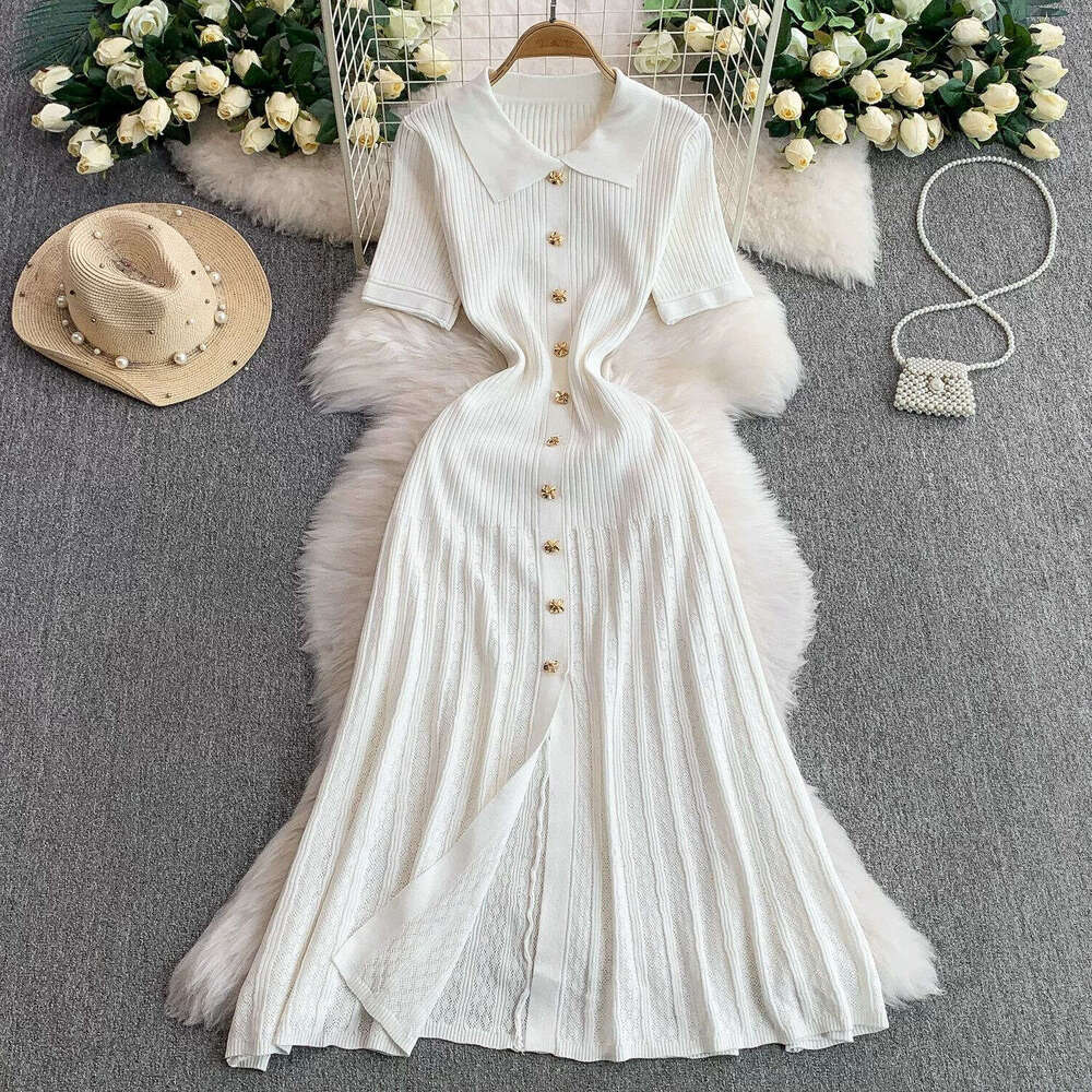 Elegant women's style short sleeved A-line new metal buckle waist slimming fish tail cut knitted dress 2026