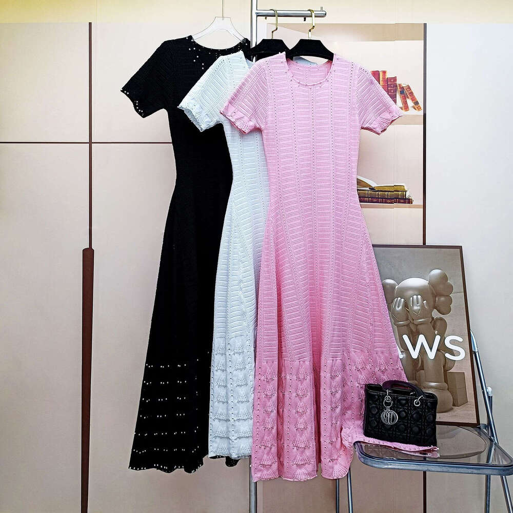 2026 designer French women's fashion summer new short sleeved knitted hollow slimming A-line dress