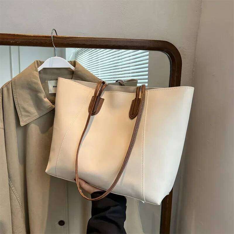 Hot Selling Light Luxury Sewing Thread Pu Zipper Handbag 2026 New Fashionable Women's Commuting Shoulder Tote Bag XJ260306