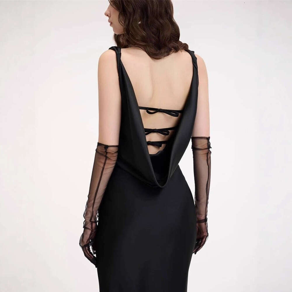 2026 new women's niche design social goddess sexy shoulder strap fake two-piece chest slimming tight mermaid long skirt