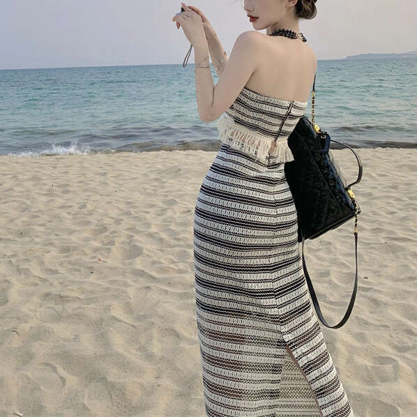 2026 Spring and Summer New French Elegant Tassel Edge Black and White Striped Knitted Tube Top and Skirt Set for Women