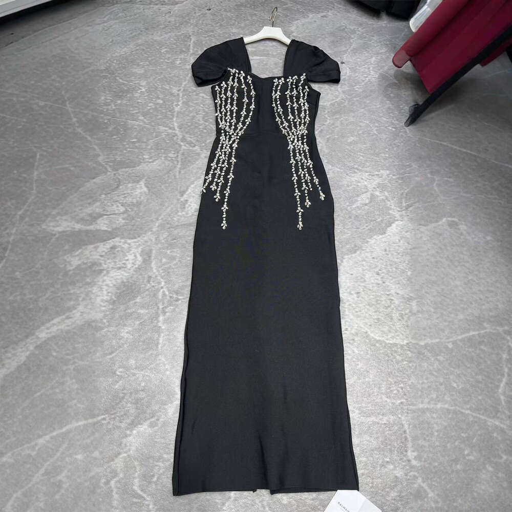 2026 new European and American style sexy off shoulder tight dress in black with thick tassels and rhinestone decoration