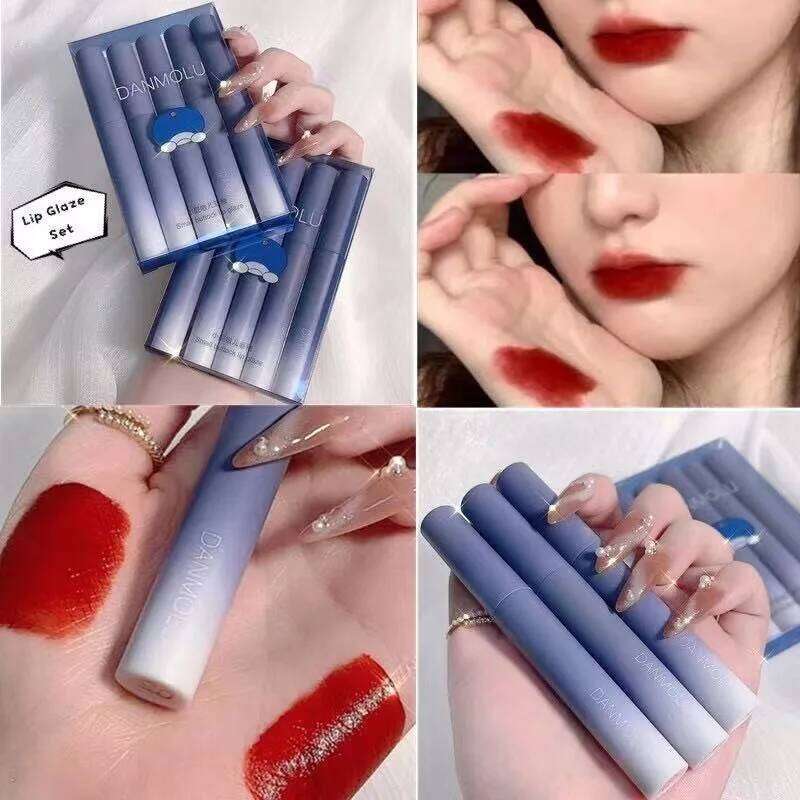 5 waterproof matte velvet lip lacquers with cartoon graphics for a smooth, glossy finish. Z260310