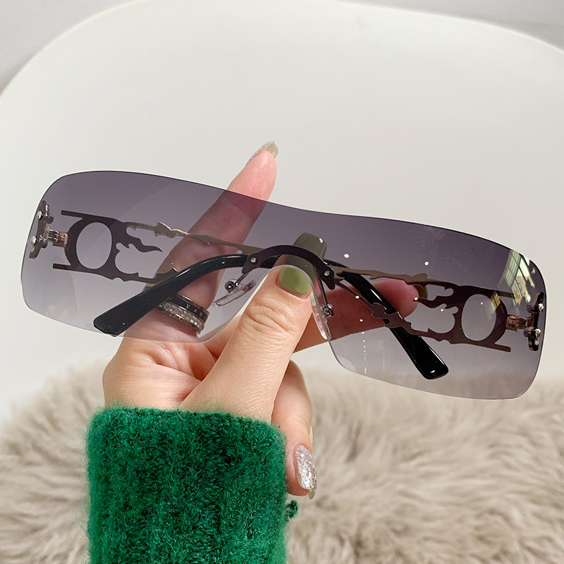 Bella style hollow Y2K millennium hot girl frameless cut-edge sunglasses new eyewear