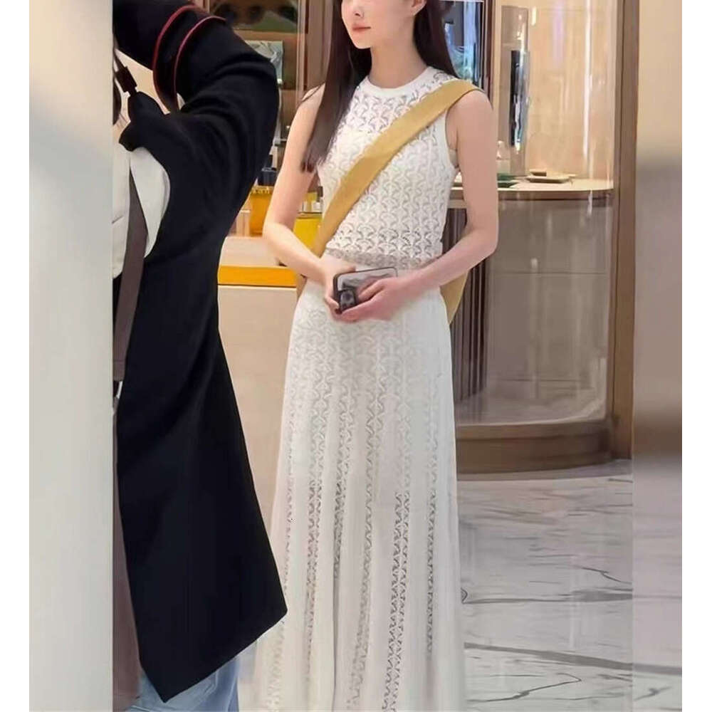 2026 Celebrity Same Style Simple White Elegant Lady Hollow Sleeveless Knitted Tank Top Long Skirt Set