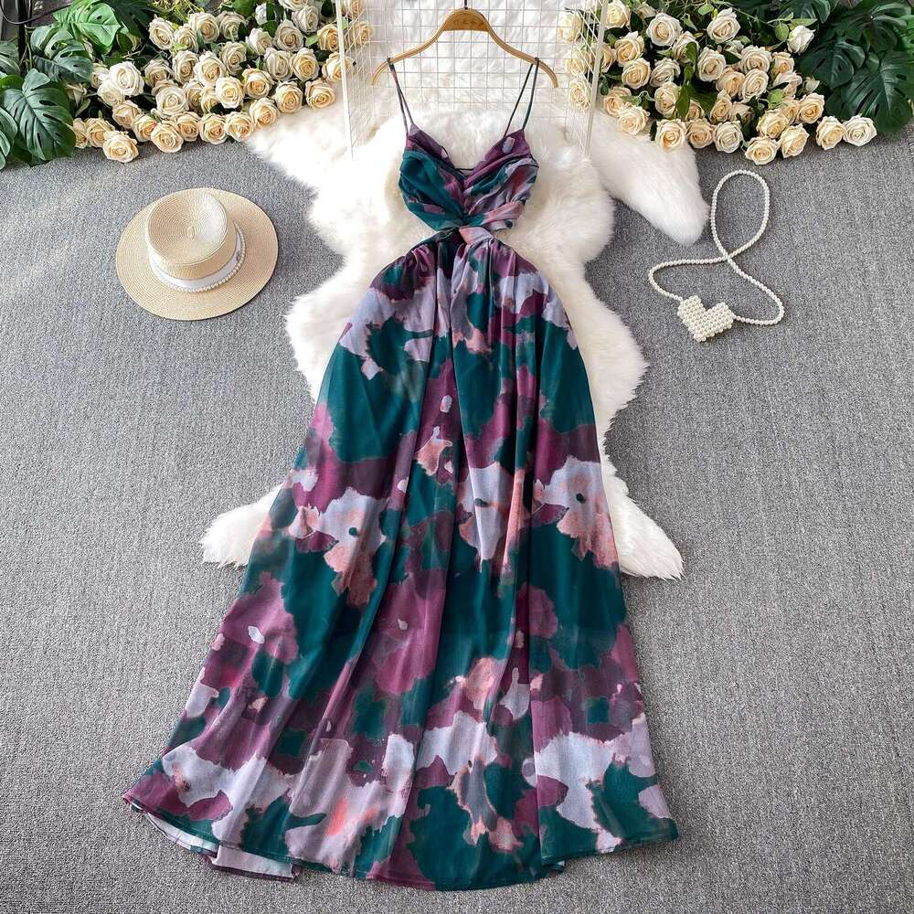 Seaside vacation style beach skirt with feminine design featuring cross twisted details, waist and shoulder straps, and a large hem