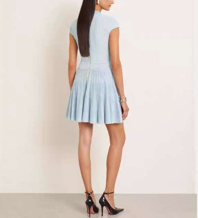 2026 European and American fashion goddess style elegant and simple solid color V-neck sleeveless design vertical stripe knitted dress