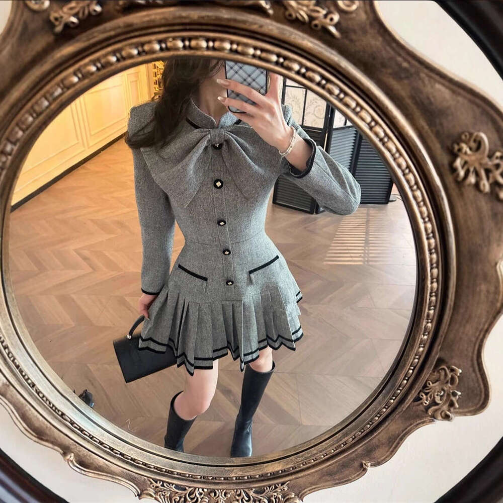 2026 autumn and winter new women's designer butterfly bow waist pleat elegant slim fit wool dress