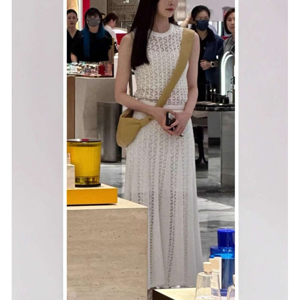 2026 Celebrity Same Style Simple White Elegant Lady Hollow Sleeveless Knitted Tank Top Long Skirt Set