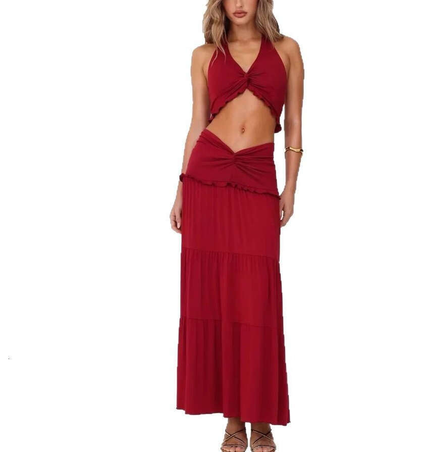2026 spring and summer women's niche fashion sexy backless and navel exposed top low waist long skirt set