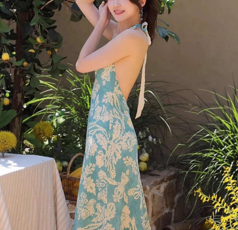 2026 new French romantic goddess sexy backless V-neck deep backless holiday style printed long dress