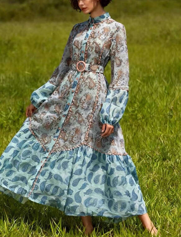 2026 spring and summer niche goddess fairy vacation style color block print lantern sleeves loose single breasted long skirt