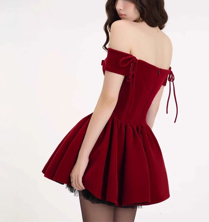 2026 new women's niche celebrity style sweet and spicy sexy strapless off shoulder dress with Christmas atmosphere and fluffy waistband design