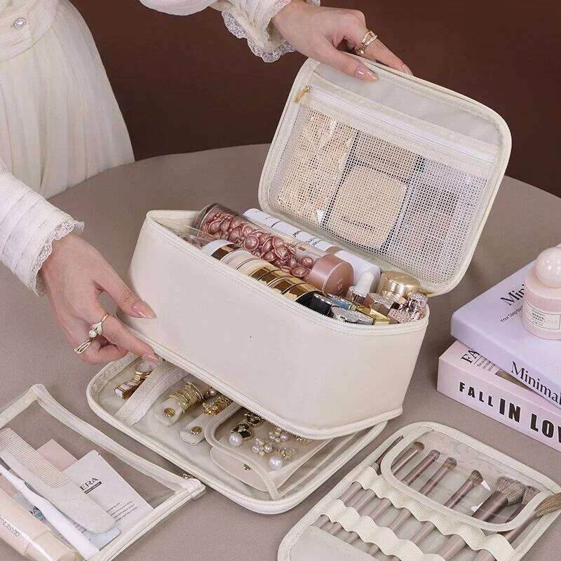 Jewelry integrated multifunctional large capacity makeup with niche design, double-layer handheld cosmetic storage bag XJ260310