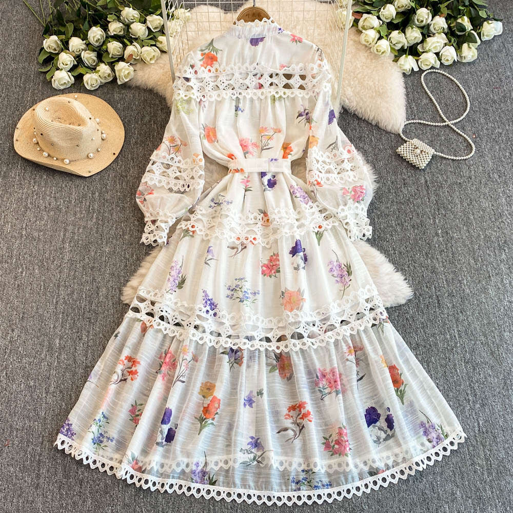 Ethnic style waist cinching slimming hollow elegant long sleeved women's autumn and winter French fashion stunning printed dress