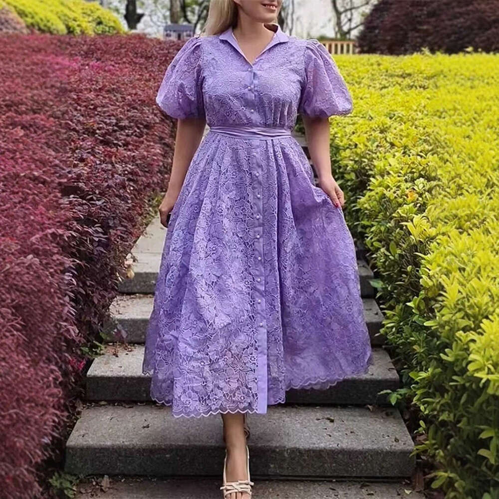 2026 new European and American niche retro palace style goddess simple solid color lantern sleeves loose lace up cardigan long skirt