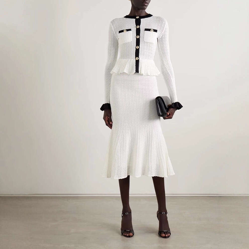 2026 autumn and winter designer fashionable and elegant color block knitted pleated top fish tail long skirt set