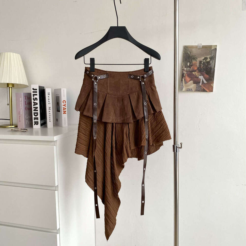Design a niche multifunctional women's irregular skirt in 2026 autumn and winter, featuring an American retro style with a belt and ruffles