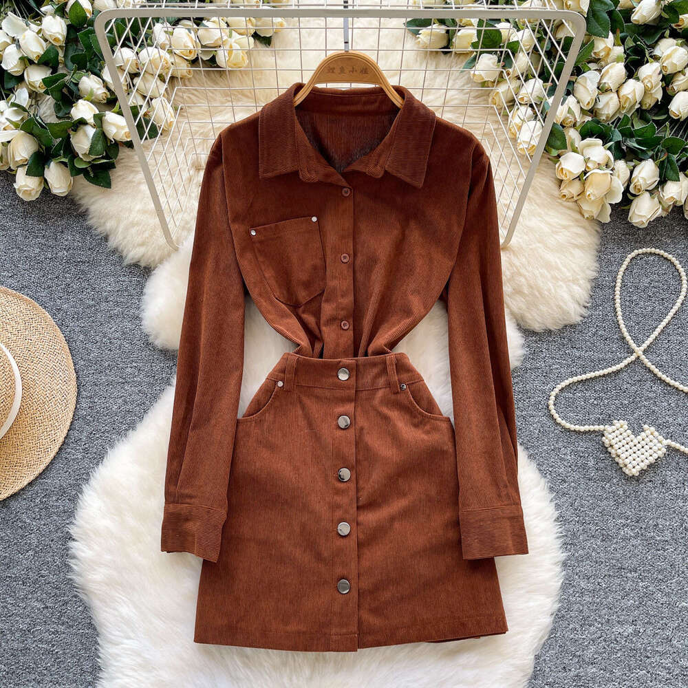 Designer's high-end niche corduroy dress, women's standing collar long sleeved autumn and winter waist cinching slimming single breasted