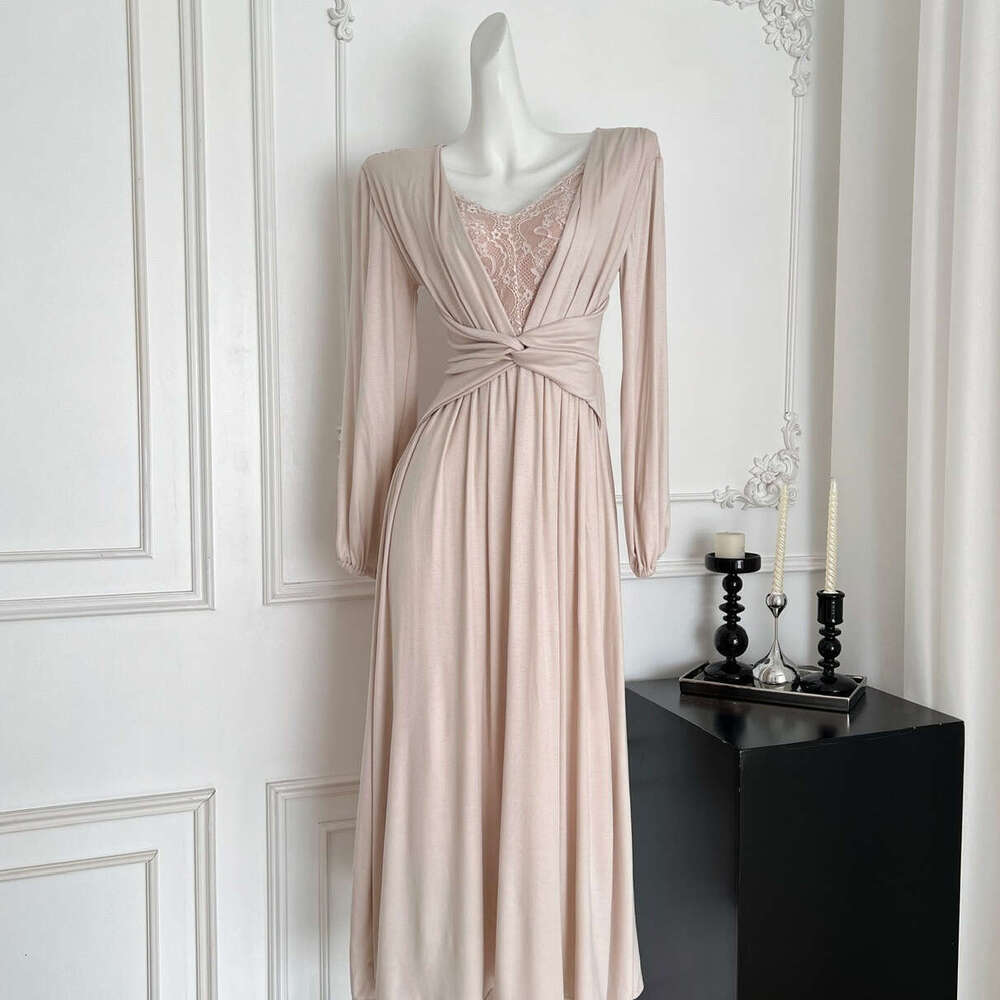 2026 French elegant and sexy V-neck lace patchwork long sleeved dress with fashionable twisted design and waistband effect