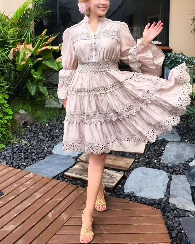 2026 autumn and winter European and American niche elegant lace patchwork bell sleeves waist slimming solid color dress