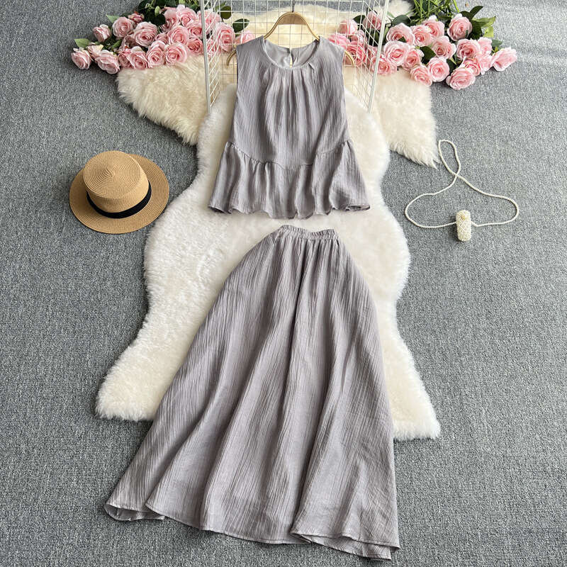 2026 Designer Gentle Style Women's Two Piece French Sweet Loose Sleeveless Top High Waist Slimming Trumpet Skirt