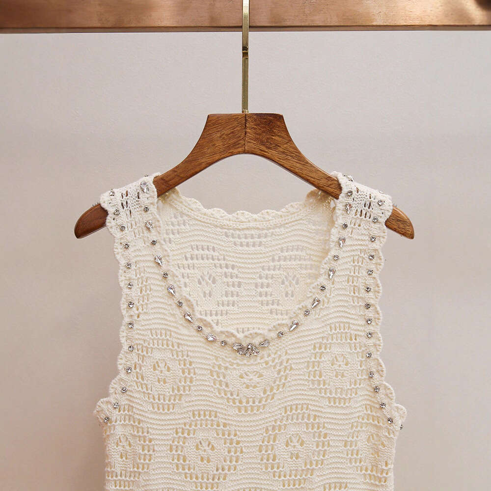 2026 designer high-end women's clothing autumn new style French crochet hollow rhinestone U-neck knitted dress