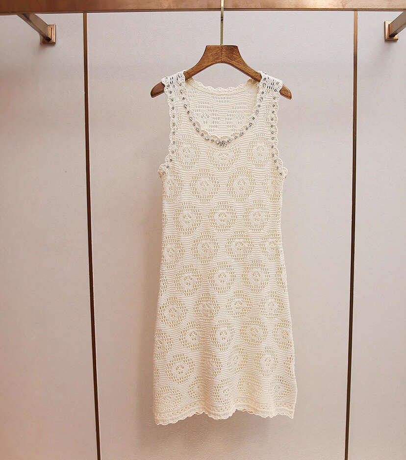 2026 designer high-end women's clothing autumn new style French crochet hollow rhinestone U-neck knitted dress