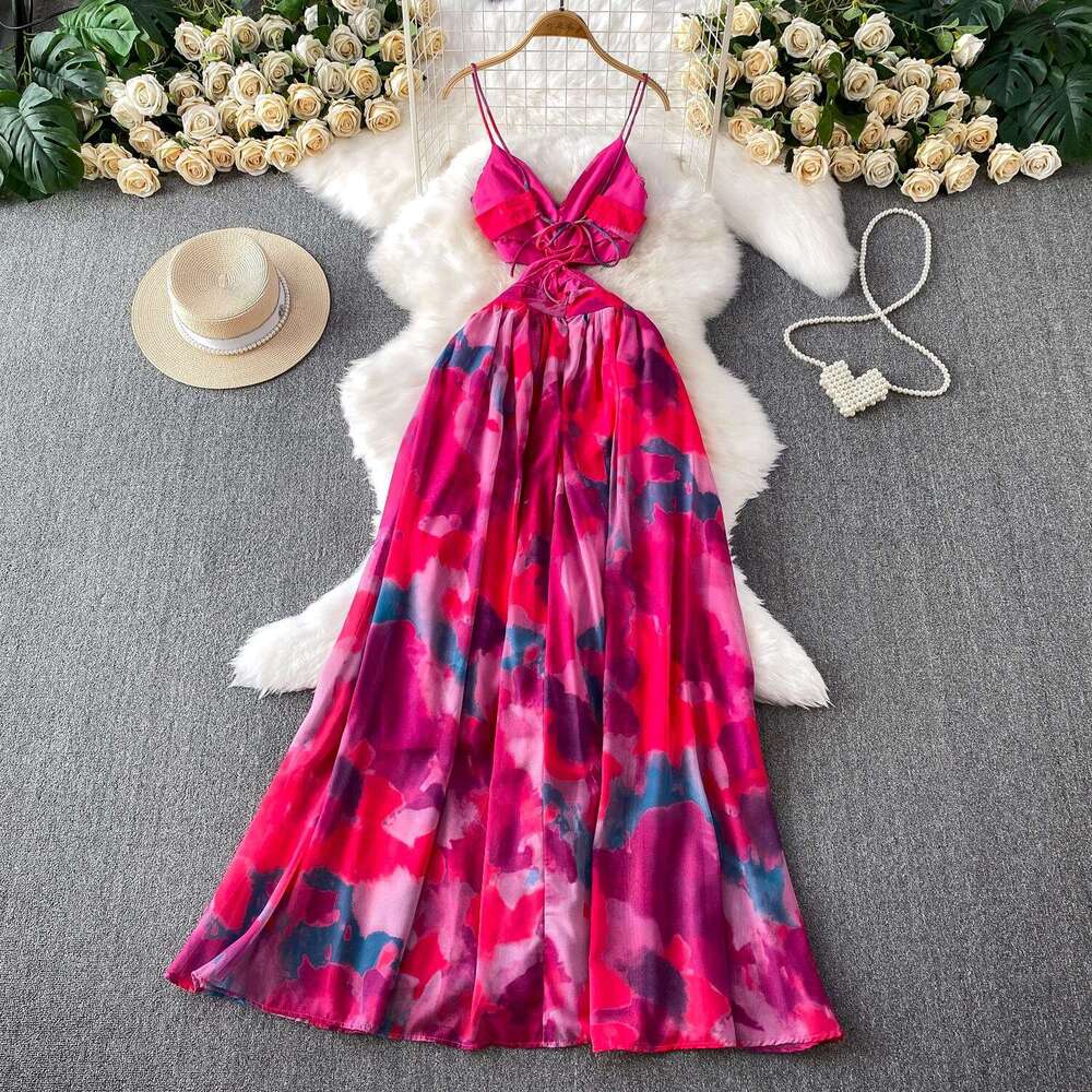 Seaside vacation style beach skirt with feminine design featuring cross twisted details, waist and shoulder straps, and a large hem