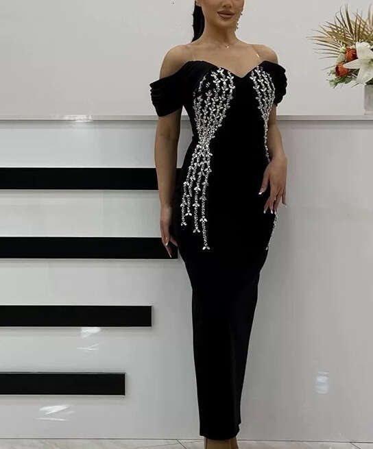 2026 new European and American style sexy off shoulder tight dress in black with thick tassels and rhinestone decoration