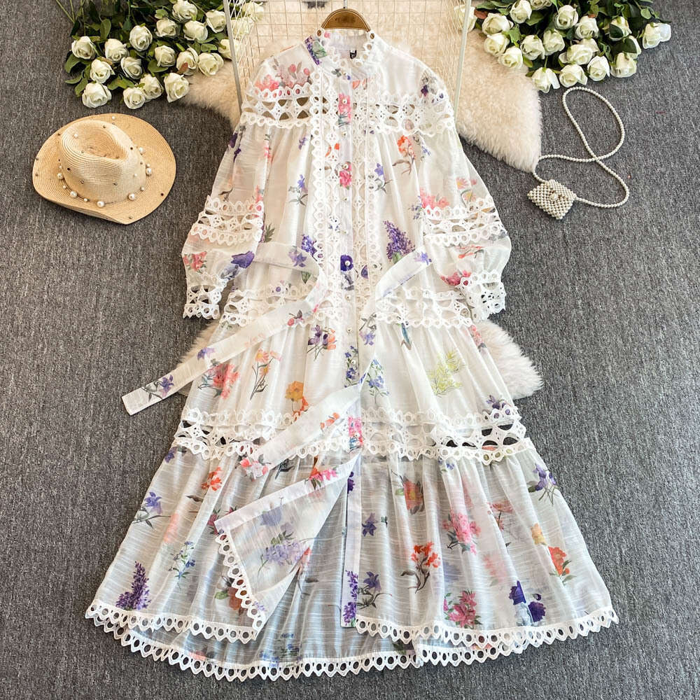 Ethnic style waist cinching slimming hollow elegant long sleeved women's autumn and winter French fashion stunning printed dress