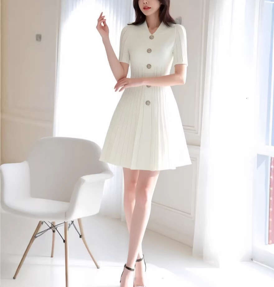 2026 Spring and Summer New Polo Collar Single breasted Dress Fashionable and Elegant Commuter Tight A-line Short Skirt at Waist