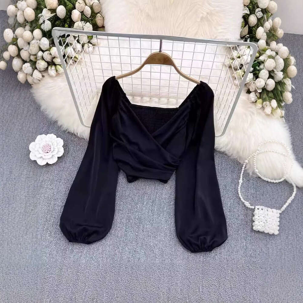 Spring fashion V-neck pleated collarbone exposed fluffy long sleeved pullover for women's fashionable and unique short top