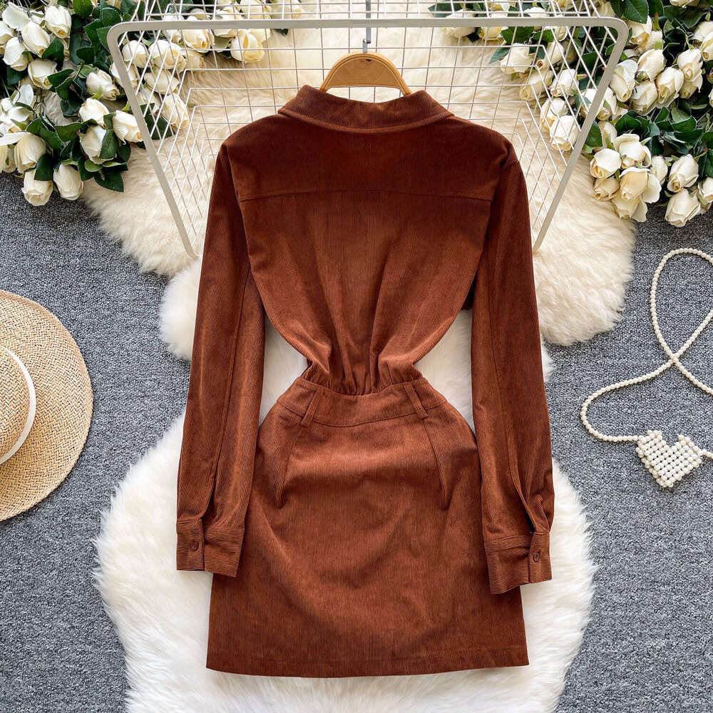 Designer's high-end niche corduroy dress, women's standing collar long sleeved autumn and winter waist cinching slimming single breasted
