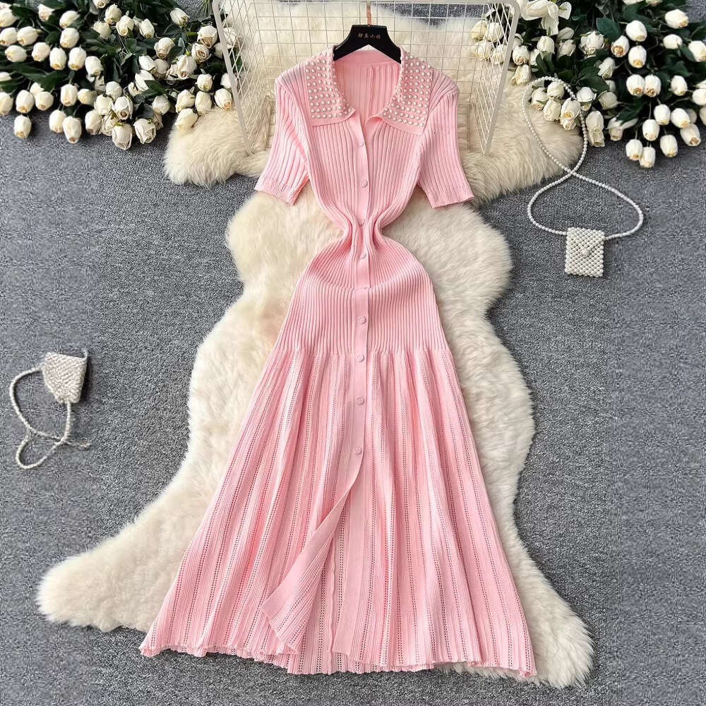 2026 vintage Hepburn style bead embellishment lapel knit women's autumn and winter single breasted waist with elegant fishtail long skirt